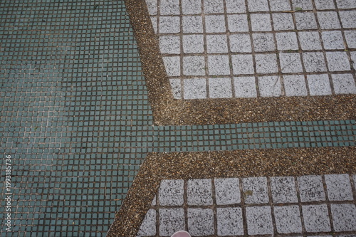 pavement and stones on sidewalk. Paving slabs in a public park.