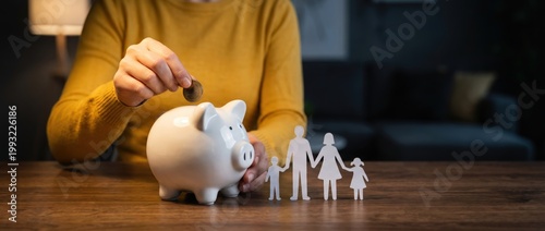 Saving for the future family financial planning with a piggy bank home office setting photography evening light personal finance concept