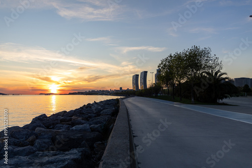 Obraz na płótnie Istanbul Kartal Coast Sunset with Fishermen Silhouettes, Sea of Marmara and Prin