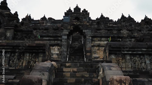 Cinematic footage of the iconic Borobudur Temple in Indonesia. Majestic stone stupas, ancient carvings, and serene atmosphere create a powerful spiritual and cultural scene.