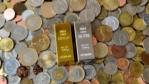 Gold and silver bullion or ingots as metals for bank storage, investments, and financial transactions. Gold and silver bars as a backdrop for your design