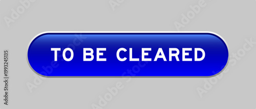 Blue color capsule shape button with word to be cleared on gray background