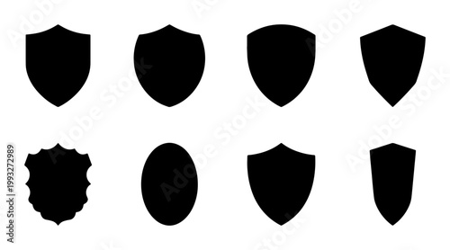 Minimalist shield silhouette collection, 8 black security icons for logo design, heraldic crest shapes and protection symbols, vector set for branding