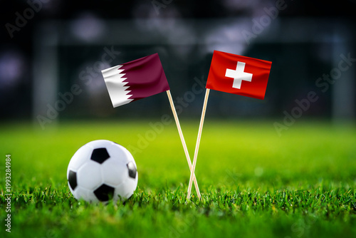 Qatar vs Switzerland, national flags before world championship Group B group stage match, football on green pitch with goal in the background, Santa Clara, USA, June 13, 2026