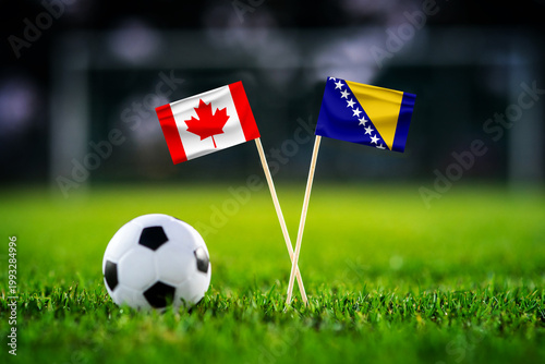 Canada vs Bosnia and Herzegovina, national flags before world championship Group B group stage match, football on green pitch with goal in the background, Toronto, Canada, June 12, 2026
