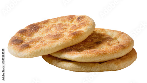 Obraz na plátně Stacked rustic flatbreads with golden brown crusts and flaky texture