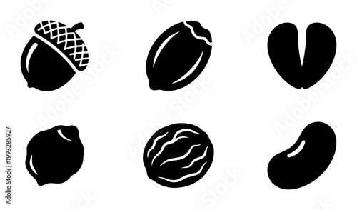 Minimalist nut and seed icons set, black silhouette acorn and walnut vector graphics, organic food and legume symbols for packaging design