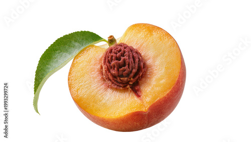Schilderij op canvas Ripe halved peach with green leaf and brown pit close-up