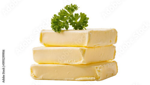 Εκτύπωση καμβά Stacked yellow butter blocks garnished with fresh green parsley sprig