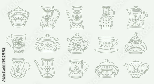 Collection of Vintage Ceramic Teapots and Cups with Ornate Designs.