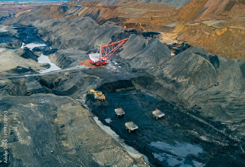 Billede på lærred Aerial panoramic view captures industrial scale coal mining operation featuring