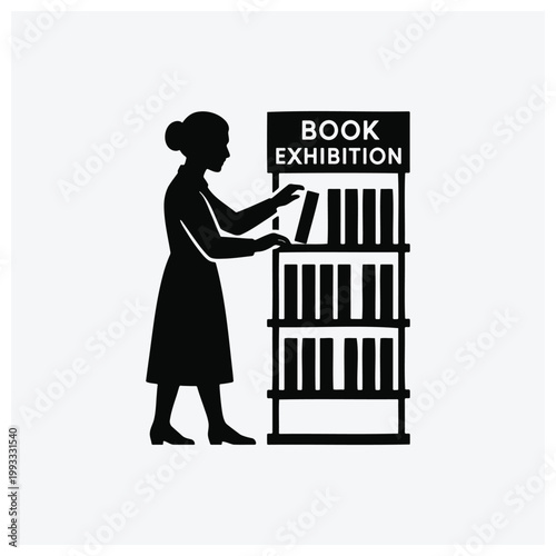 Woman viewing a book exhibition display