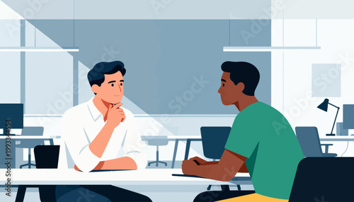 Two men converse across a modern office table