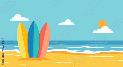 Three colorful surfboards standing upright on a sandy beach.