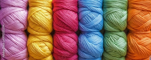 Colorful Yarn Skeins Stacked in a Row for Crafting and Knitting