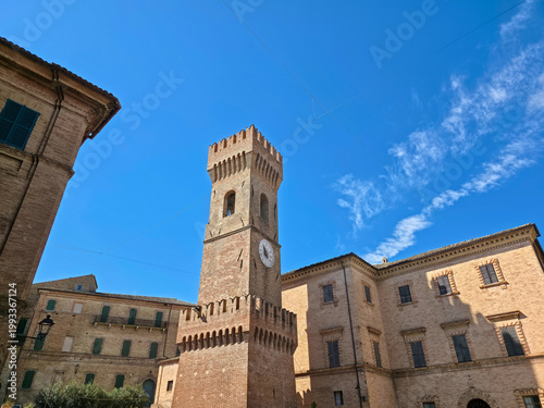 Vászonkép The historic Torre Civica clock tower and Piazza dei Martiri in Ostra, medieval