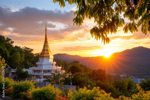 Majestic Temple Silhouette Against a Glowing Orange Sky at Sunset with Lush Green Surroundings