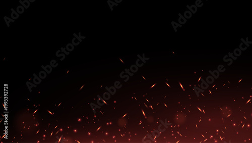 Realistic flames with hot sparks, flying sparks, and hot ash particles against a dark background. A fiery explosion effect with a vibrant glow and thermal energy for overlays and visual effects.