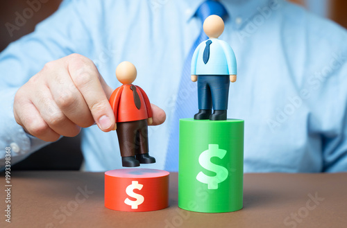 Fotografie Comparison of salaries in business positions