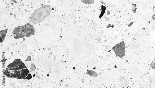 Seamless monochrome terrazzo texture background vector illustration with abstract grey and white stone fragment pattern.