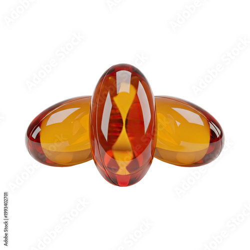 Three translucent, amber-colored capsules, slightly overlapping against a black background