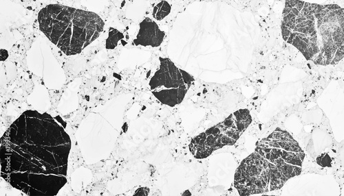 Seamless monochrome terrazzo texture background vector illustration with abstract grey and white stone fragment pattern.