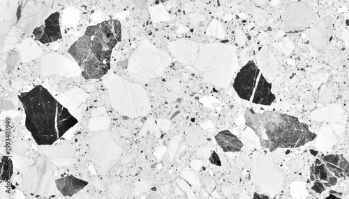 Seamless monochrome terrazzo texture background vector illustration with abstract grey and white stone fragment pattern.