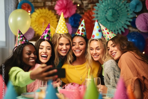 Friends Celebrate Together at a Colorful Party Taking Selfies With Cake and D...