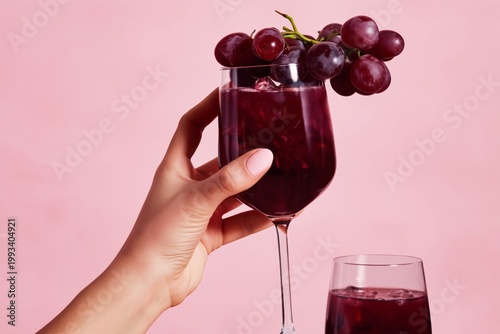 Enjoying Cold Cherry Drinks on a Pink Background in a Bright Setting With Ice...