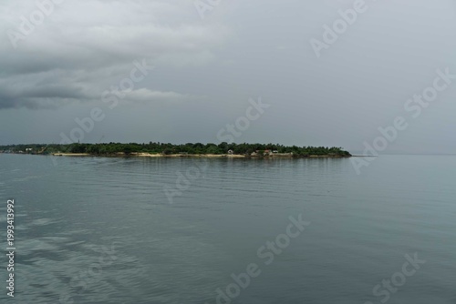 a view of the sea and clouds