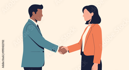Businessman and businesswoman shaking hands.