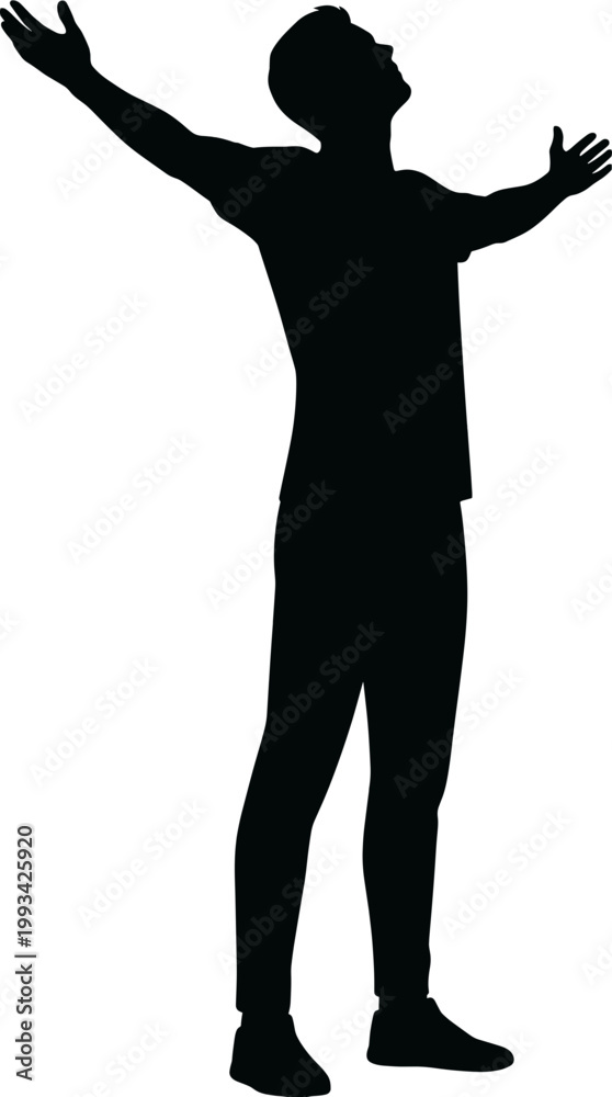 Fototapeta premium A silhouette of a man with arms outstretched enjoying a moment of freedom and connection