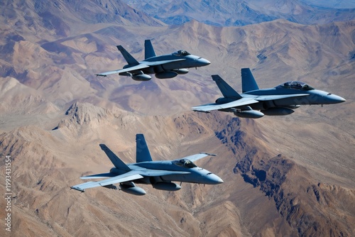 Fighter Jets Fly Over Mountains During a Training Exercise in a Sunny Environ...