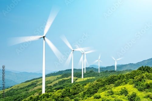 Wind Turbines on Hills Under Clear Blue Sky in Daytime