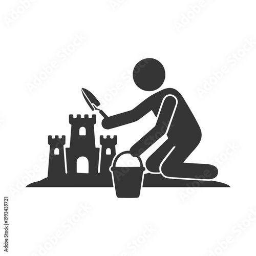 砂の城を築く人物のシルエットアイコン