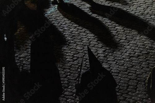 A large crowd gathers at dawn in Avila for the Penitential Via Crucis. The ancient Christ of the Executed statue is paraded along the city walls in a deeply traditional Good 