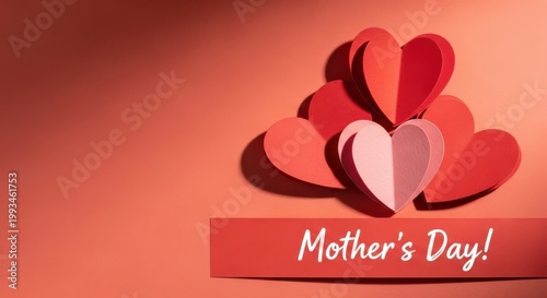 Mother's Day greeting card with paper hearts, romantic red and pink paper craft hearts, festive holiday background with copy space
