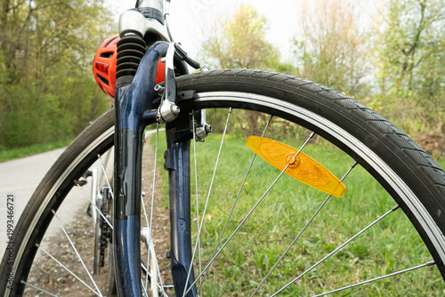 Wallpaper Mural Close-up of a bicycle wheel with yellow plastic reflector. Torontodigital.ca