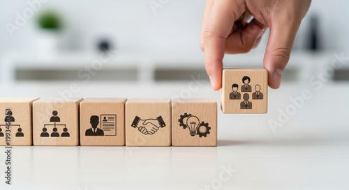 Building a successful team hand placing final piece of puzzle representing collaboration and strategic workforce planning