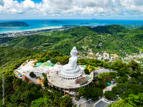 Aerial View drone shot of Big Buddha Statue on the high mountain at Phuket thailand
