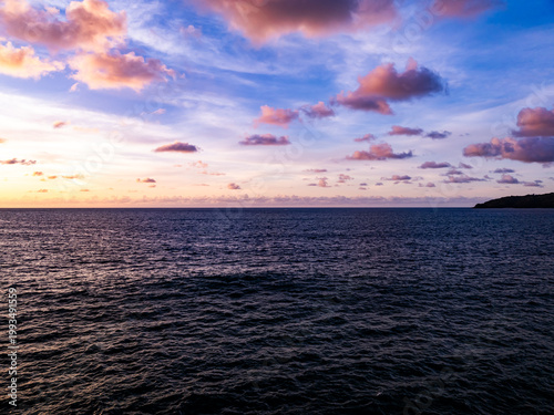Beautiful Light Sunset or sunrise over sea,Aerial view scenery Sky with Amazing clouds and waves in sunset sky nature light cloud background