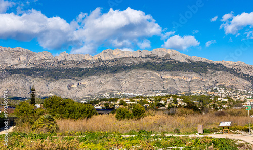 Panoramic view of Sierra de Bernia range, part of Cordilleras Beticas Baetic Mountains at Mediterranean Sea Costa Blanca shore seen from Altea town in eastern Spain