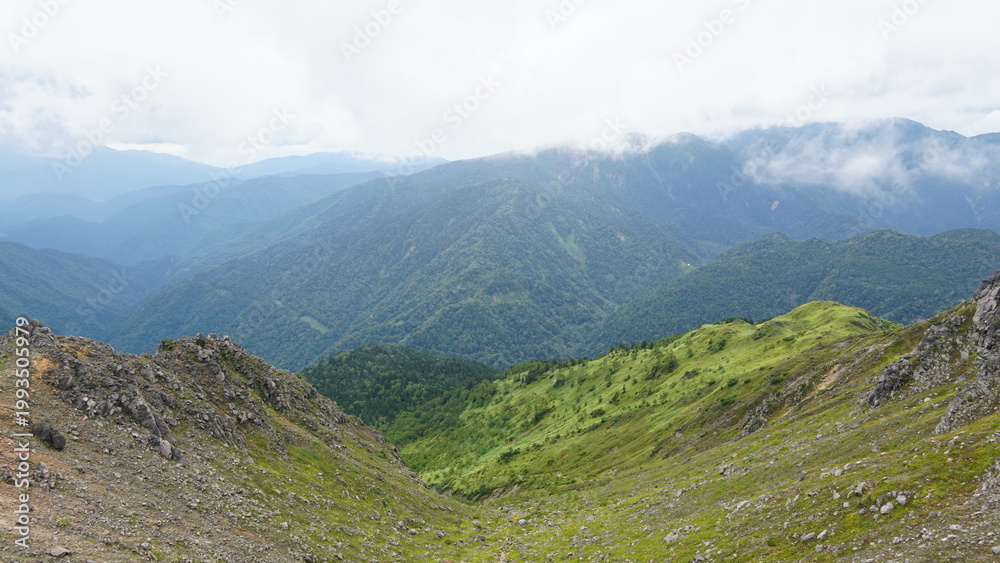 Naklejka premium Hiking the Volcano: A Summer Ascent of Mount Yakedake, Nagano, Japan