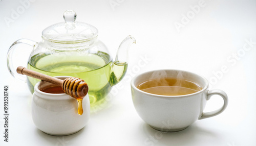 teapot, cup of tea with honey