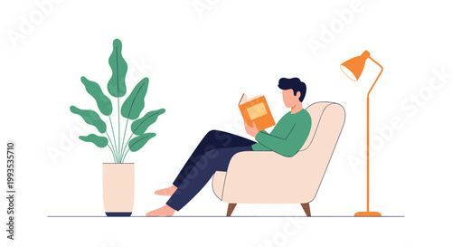 Man relaxing in a cozy armchair and reading an orange book by a floor lamp with a large houseplant beside him.