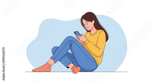 Young woman sitting comfortably on the floor and looking at her smartphone while relaxing against a soft blue background shape.