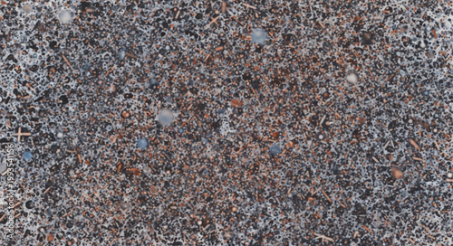 Abstract pattern of small grey stones and pebbles texture.