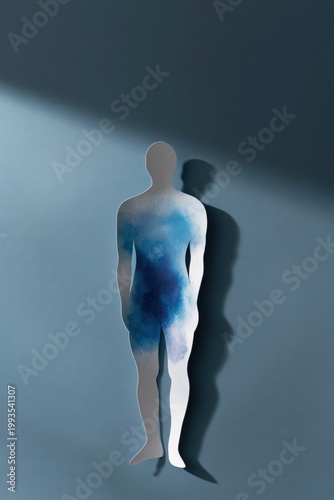 Paper human silhouette with blue watercolor and shadow