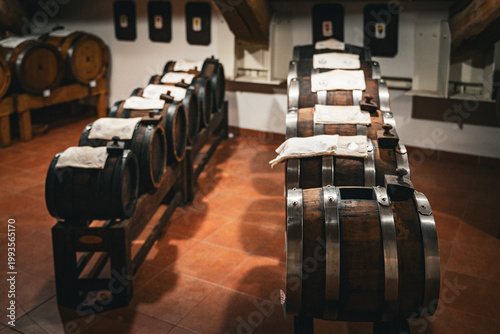 Tableau sur toile Traditional balsamic vinegar aging in wooden barrels in Italy, Modena, Emilia Ro