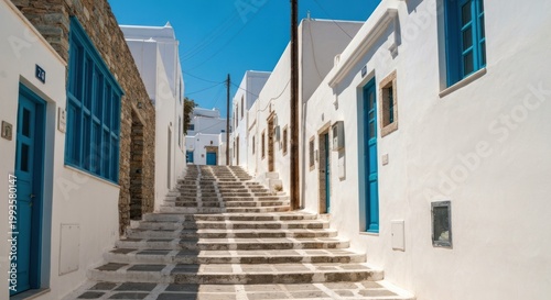 Whitewashed buildings line a stone staircase street, bright blue doors